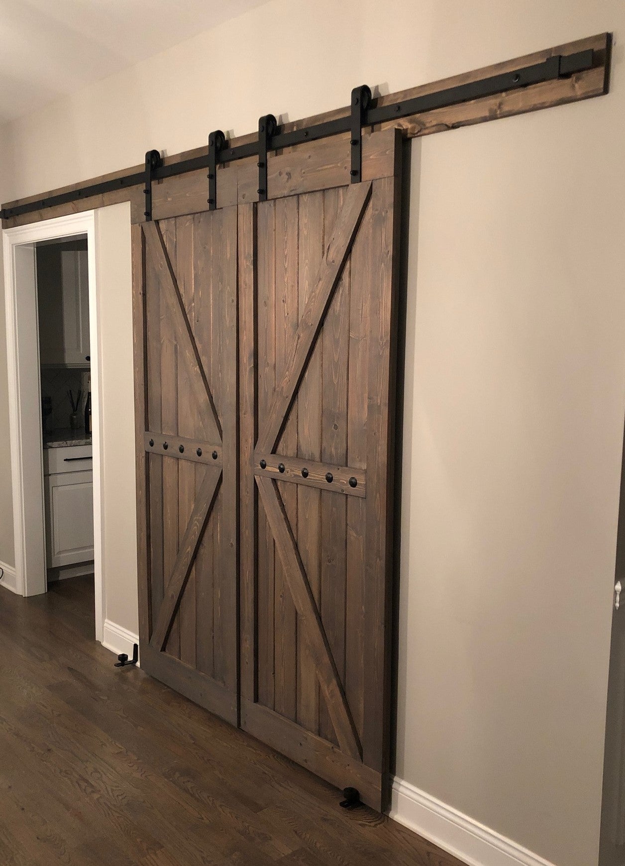 Room interior with the Custom Double British Brace K Style Barn Door