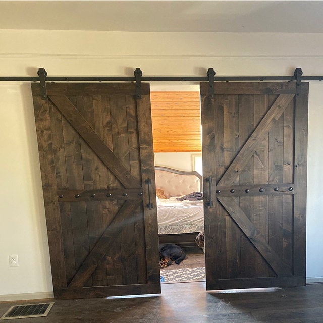 Bedroom interior with the Custom Double British Brace K Style Barn Door